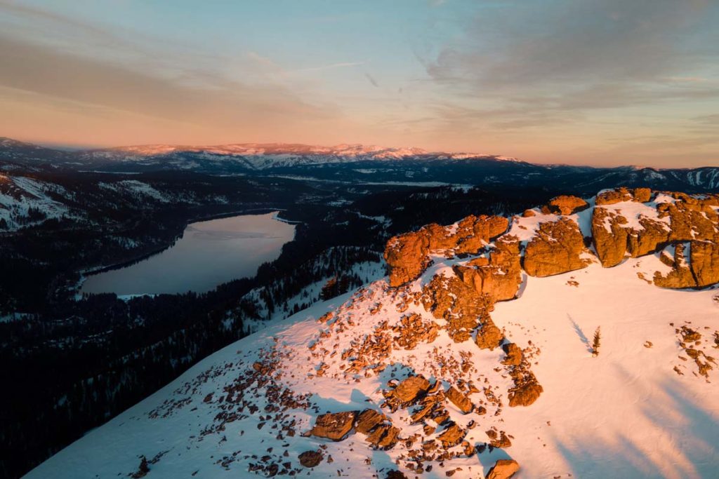 Drone image of Donner Peak at Sunset with Donner Lake in the Background.